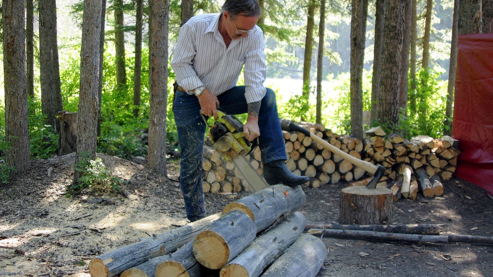 A common task for workcampers is maintaining the campground, including chopping wood for guests to use.